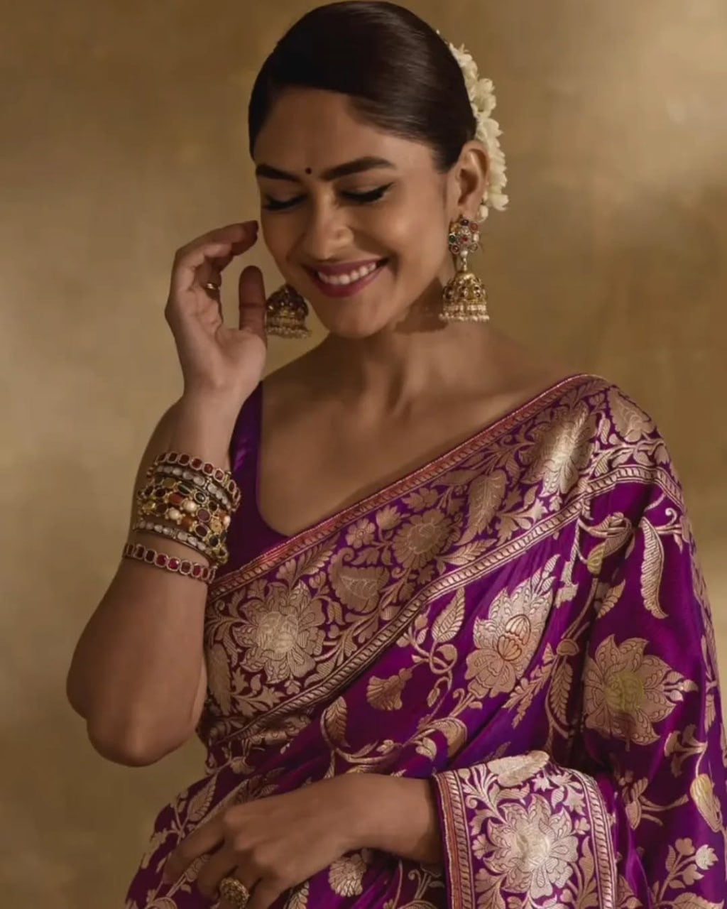 Regal Purple Banarasi Silk Saree with Intricate Golden Zari Floral Weaves