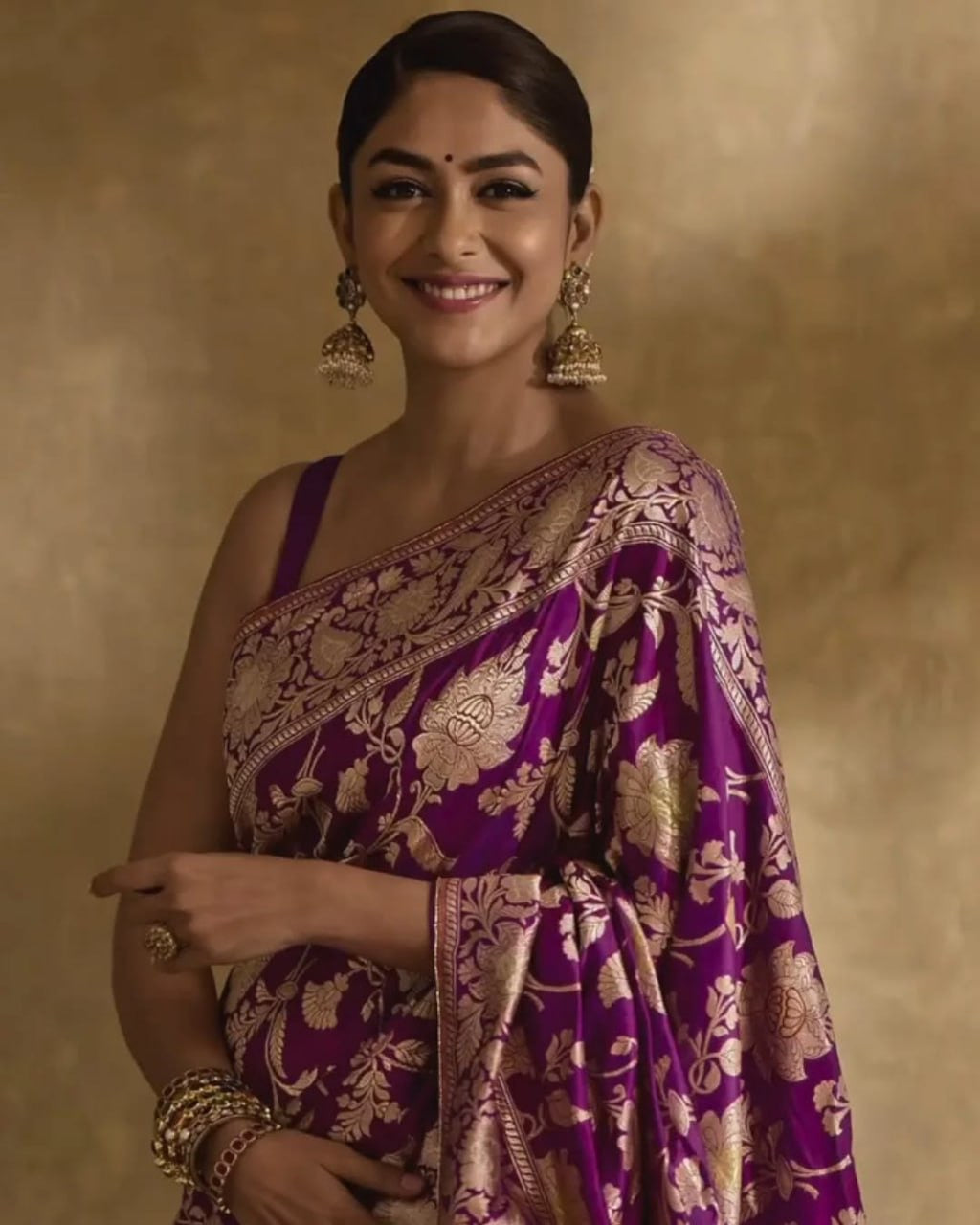 Regal Purple Banarasi Silk Saree with Intricate Golden Zari Floral Weaves