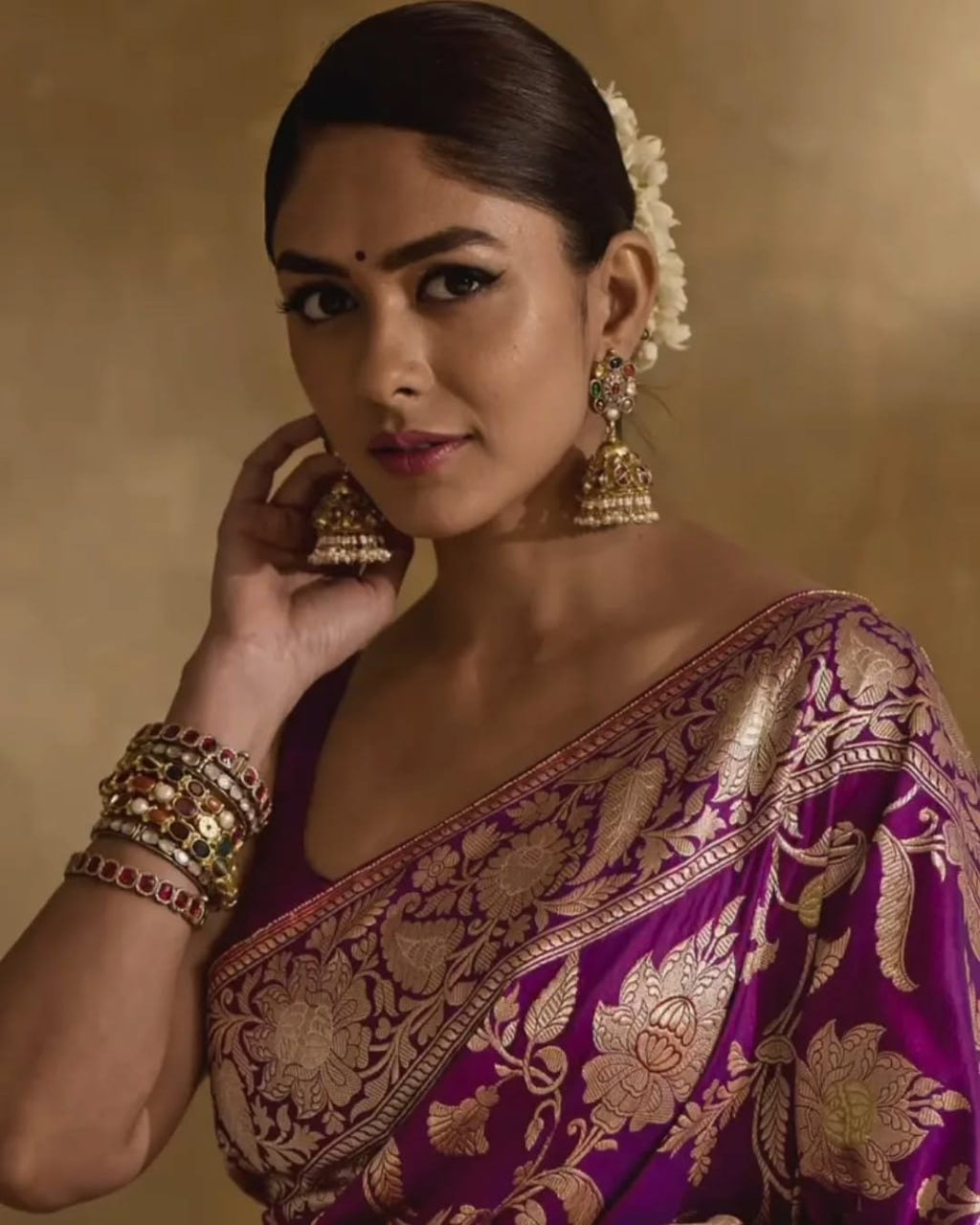 Regal Purple Banarasi Silk Saree with Intricate Golden Zari Floral Weaves