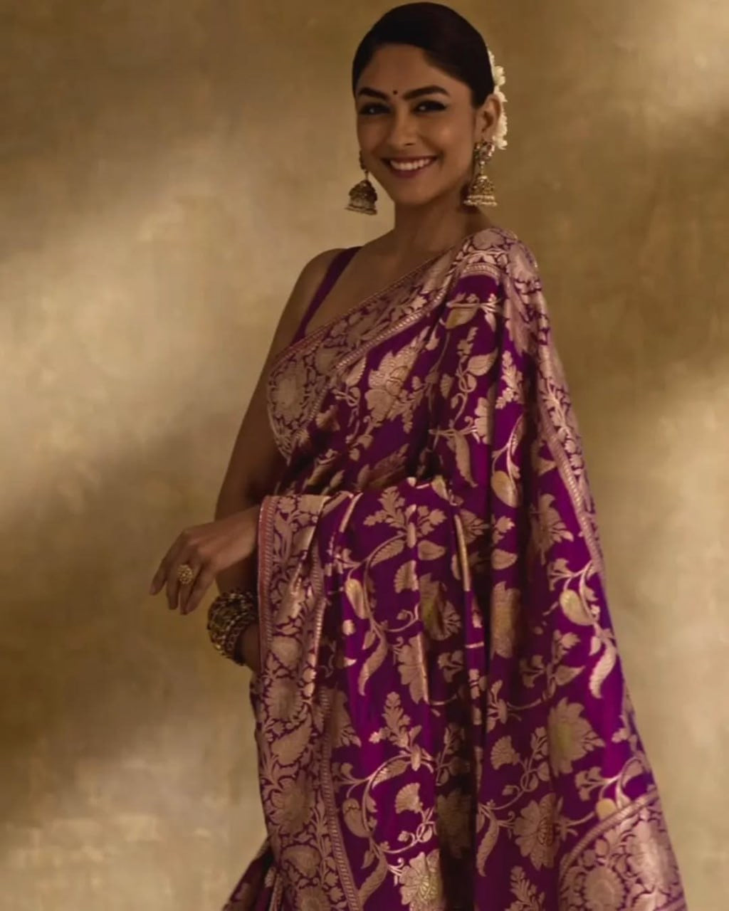 Regal Purple Banarasi Silk Saree with Intricate Golden Zari Floral Weaves