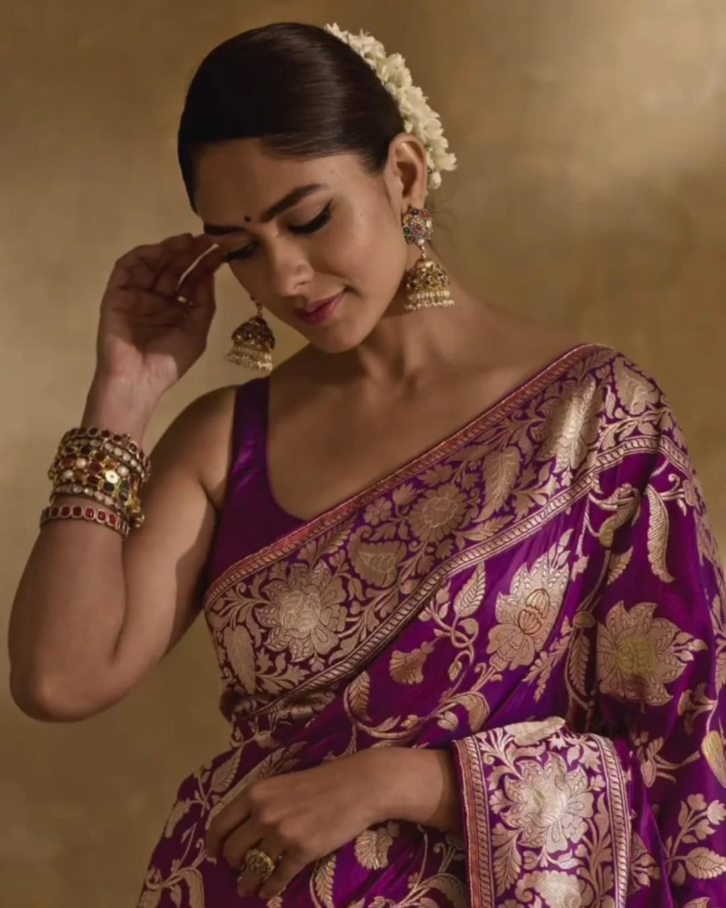 Regal Purple Banarasi Silk Saree with Intricate Golden Zari Floral Weaves