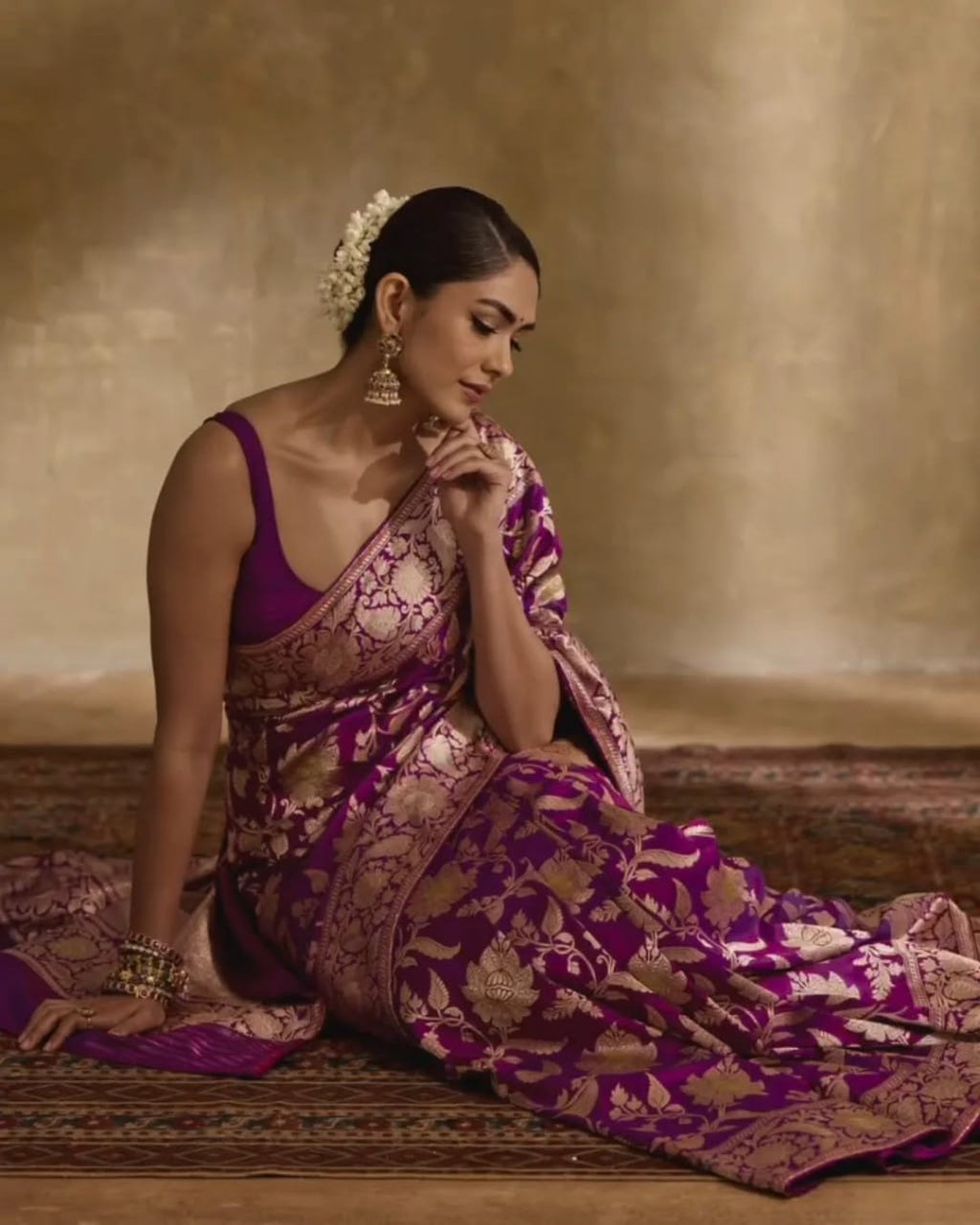 Regal Purple Banarasi Silk Saree with Intricate Golden Zari Floral Weaves