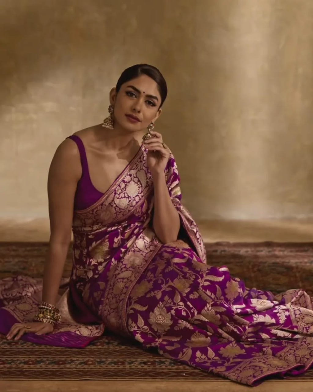 Regal Purple Banarasi Silk Saree with Intricate Golden Zari Floral Weaves