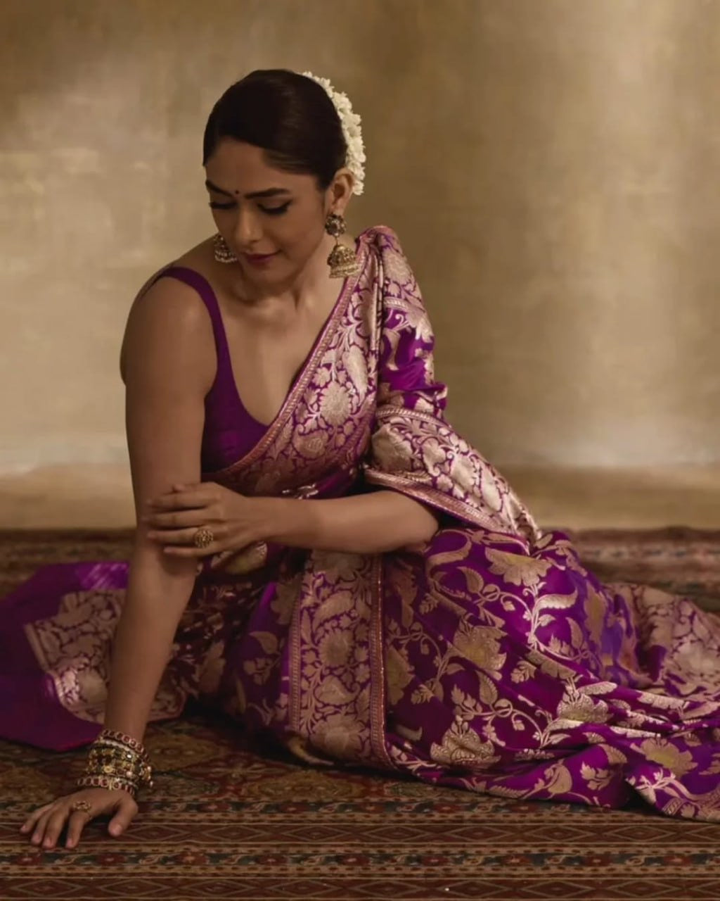 Regal Purple Banarasi Silk Saree with Intricate Golden Zari Floral Weaves