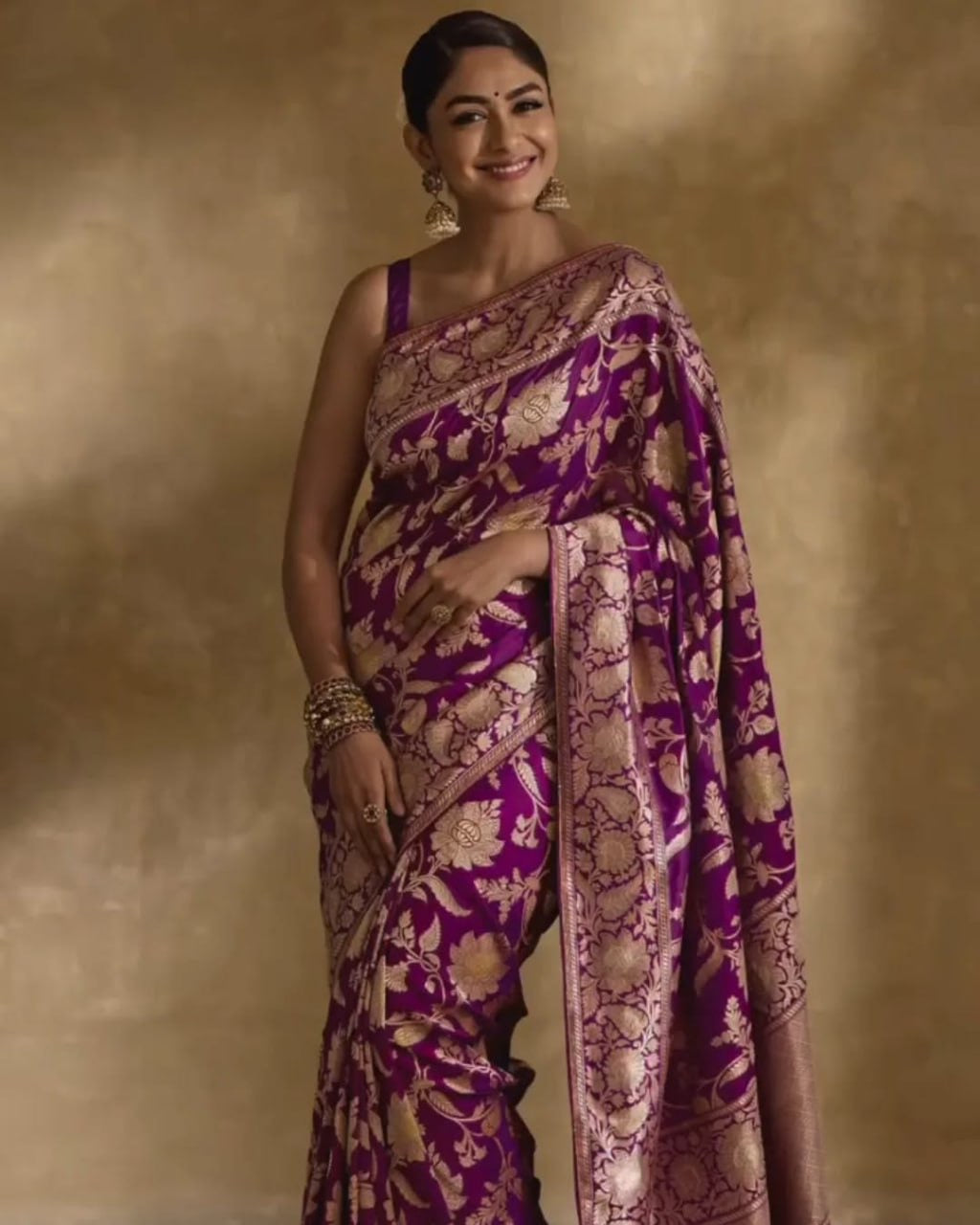 Regal Purple Banarasi Silk Saree with Intricate Golden Zari Floral Weaves