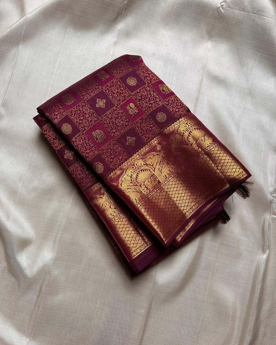 Maroon Banarasi Silk Saree with Gold Zari and Ornate Temple Motif Pallu