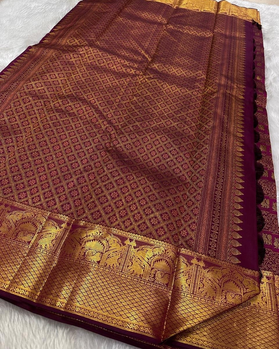 Maroon Banarasi Silk Saree with Gold Zari and Ornate Temple Motif Pallu