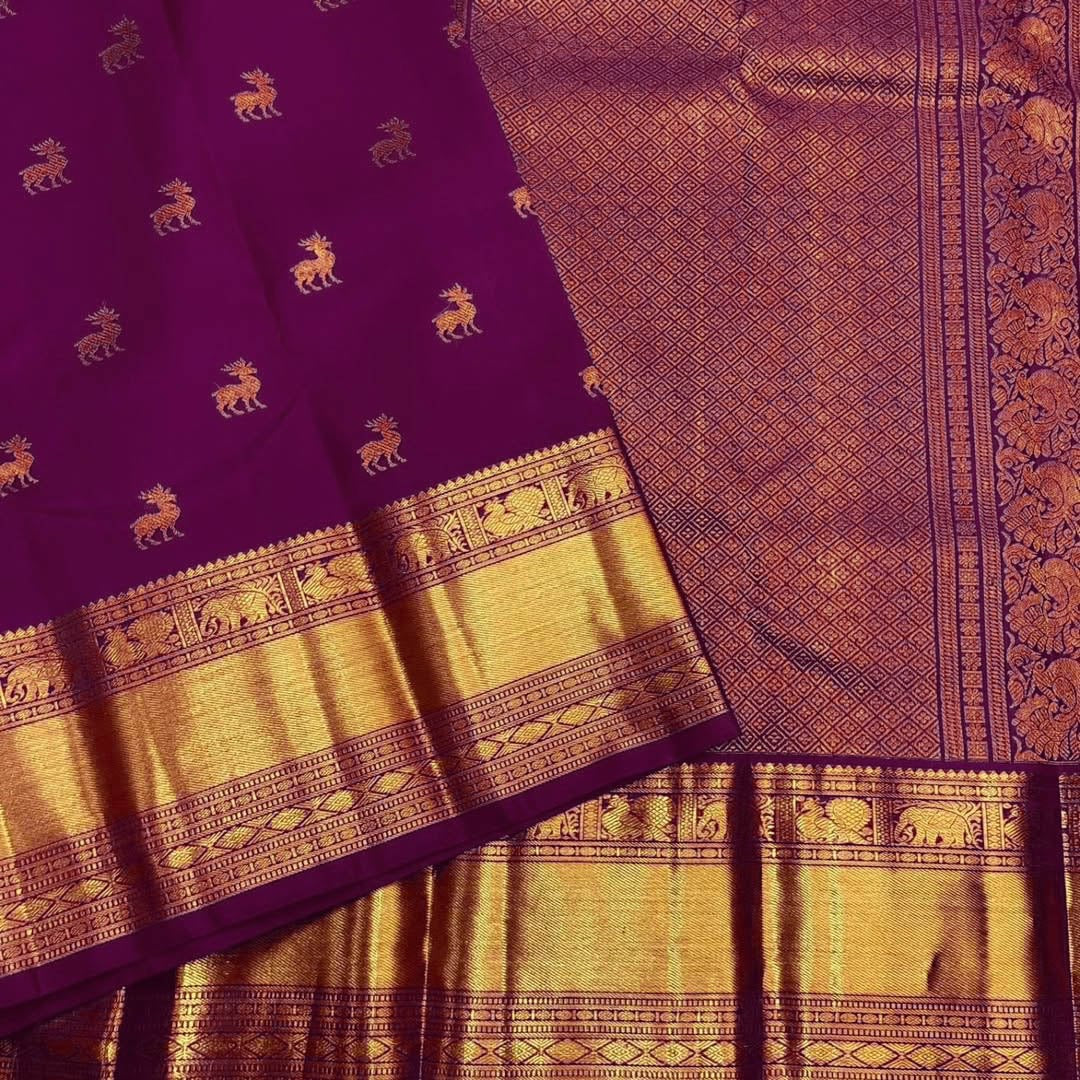 Royal Purple Kanjivaram Silk Saree with Zari Animal Motifs & Broad Golden Border