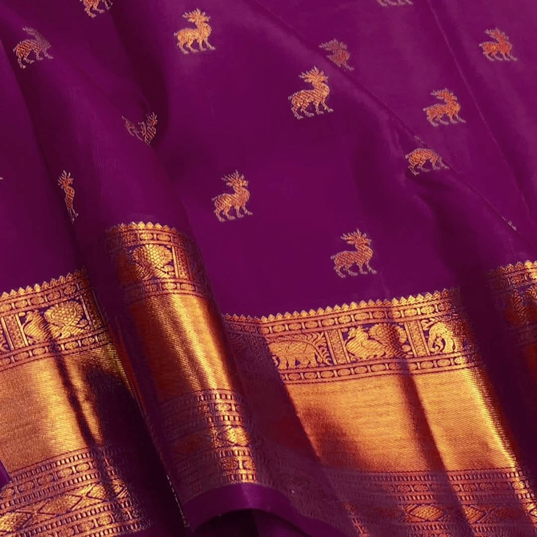 Royal Purple Kanjivaram Silk Saree with Zari Animal Motifs & Broad Golden Border