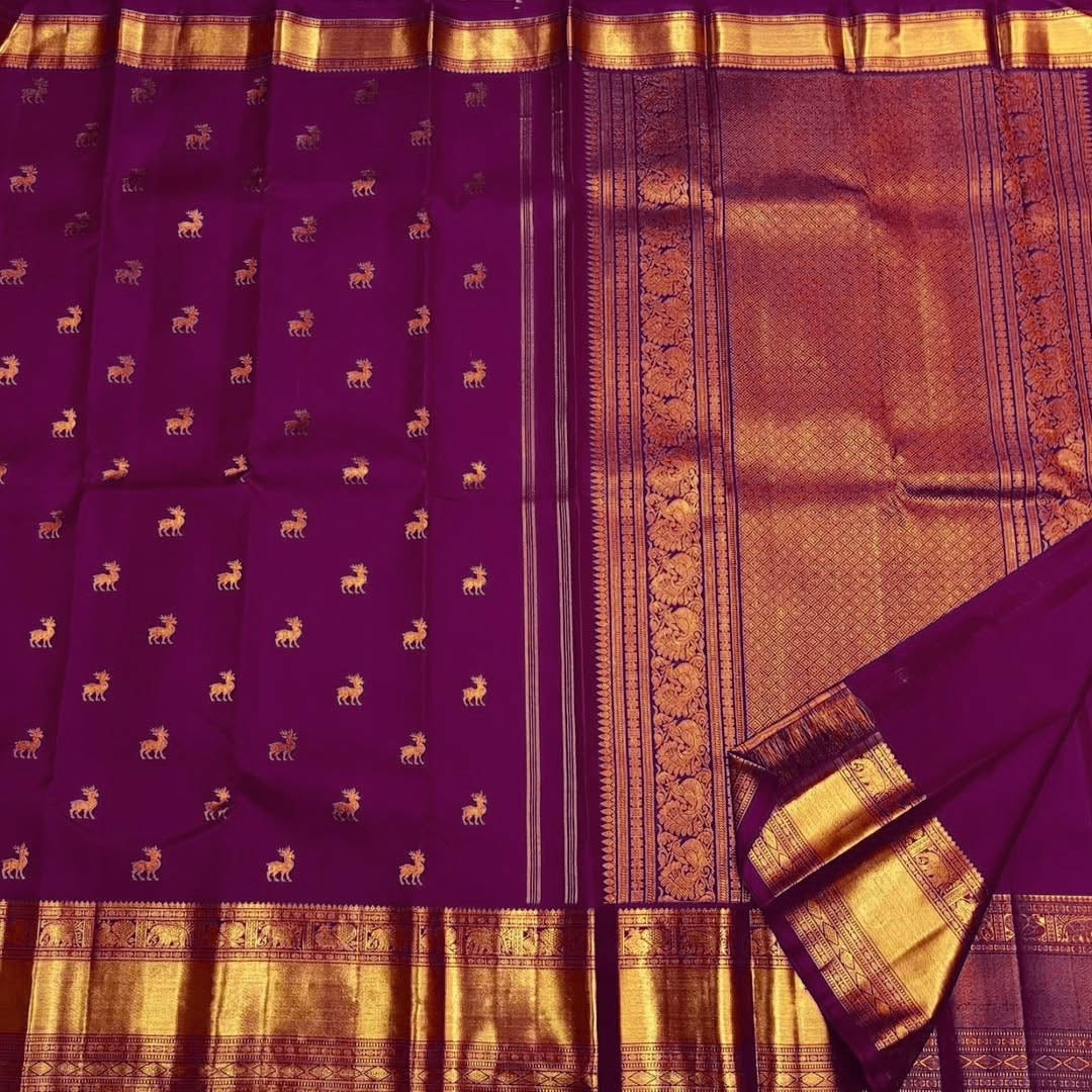 Royal Purple Kanjivaram Silk Saree with Zari Animal Motifs & Broad Golden Border