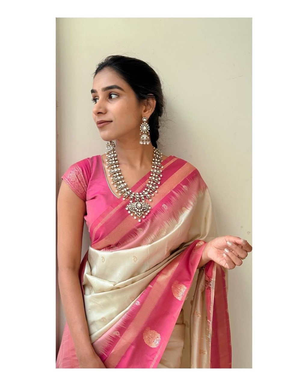 Graceful Cream Kanjivaram Silk Saree with Pink Zari Border