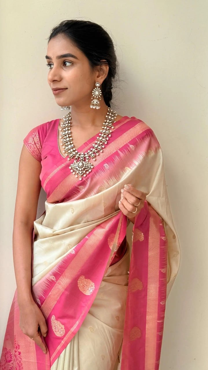 Graceful Cream Kanjivaram Silk Saree with Pink Zari Border
