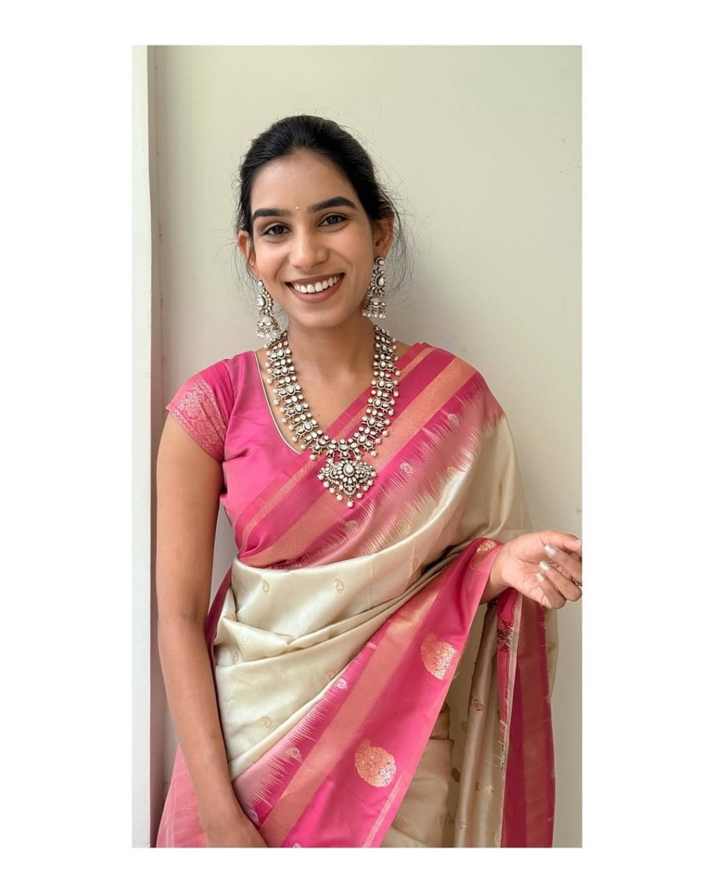 Graceful Cream Kanjivaram Silk Saree with Pink Zari Border