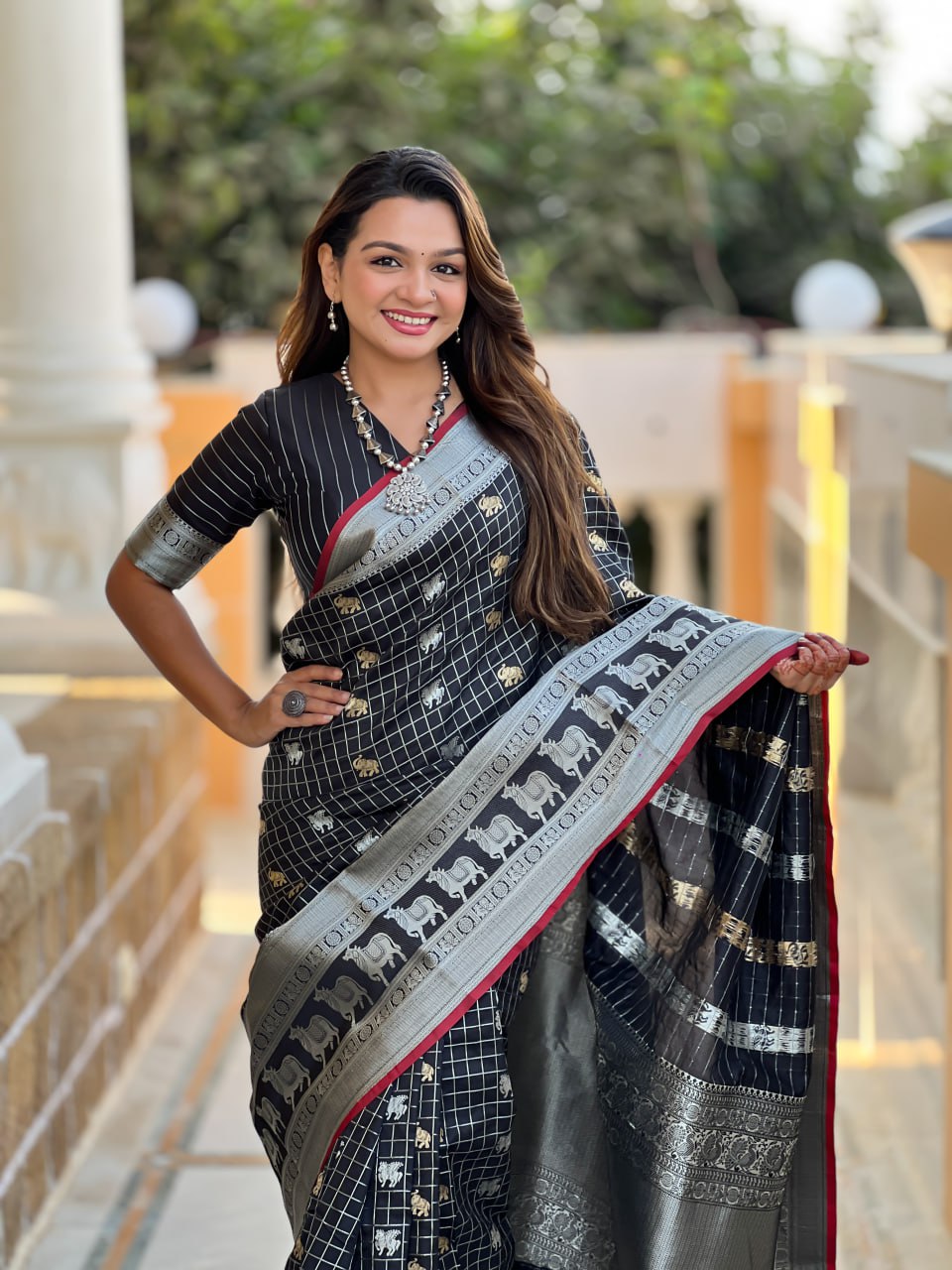 Majestic Black Silk Saree with Silver & Gold Zari Animal Motifs