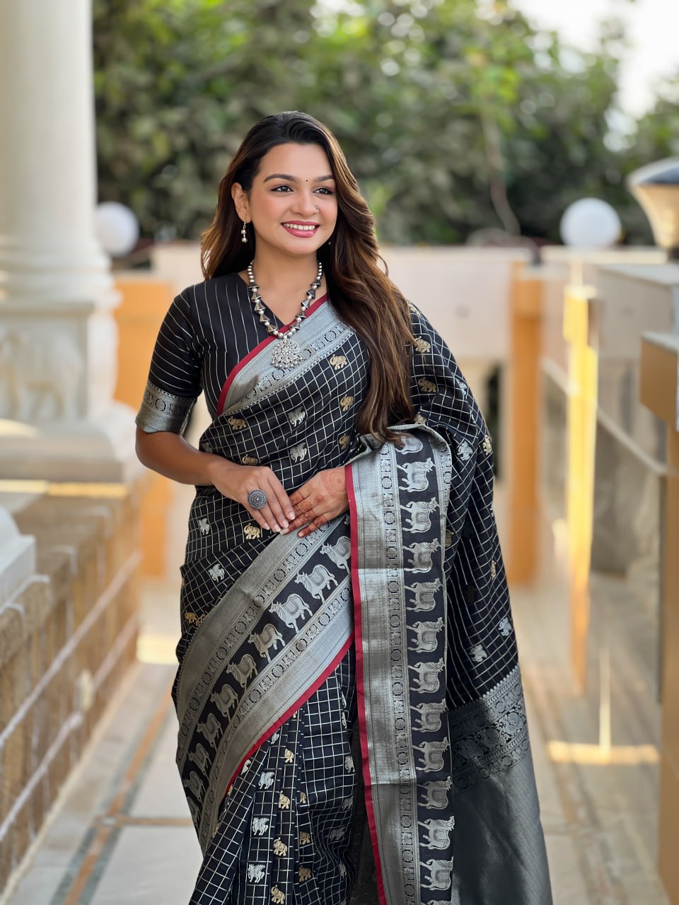 Majestic Black Silk Saree with Silver & Gold Zari Animal Motifs