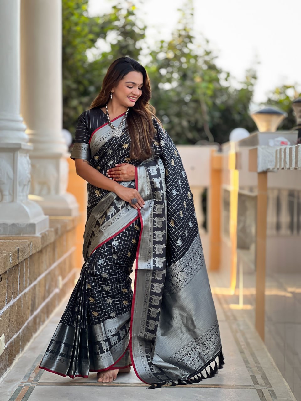 Majestic Black Silk Saree with Silver & Gold Zari Animal Motifs