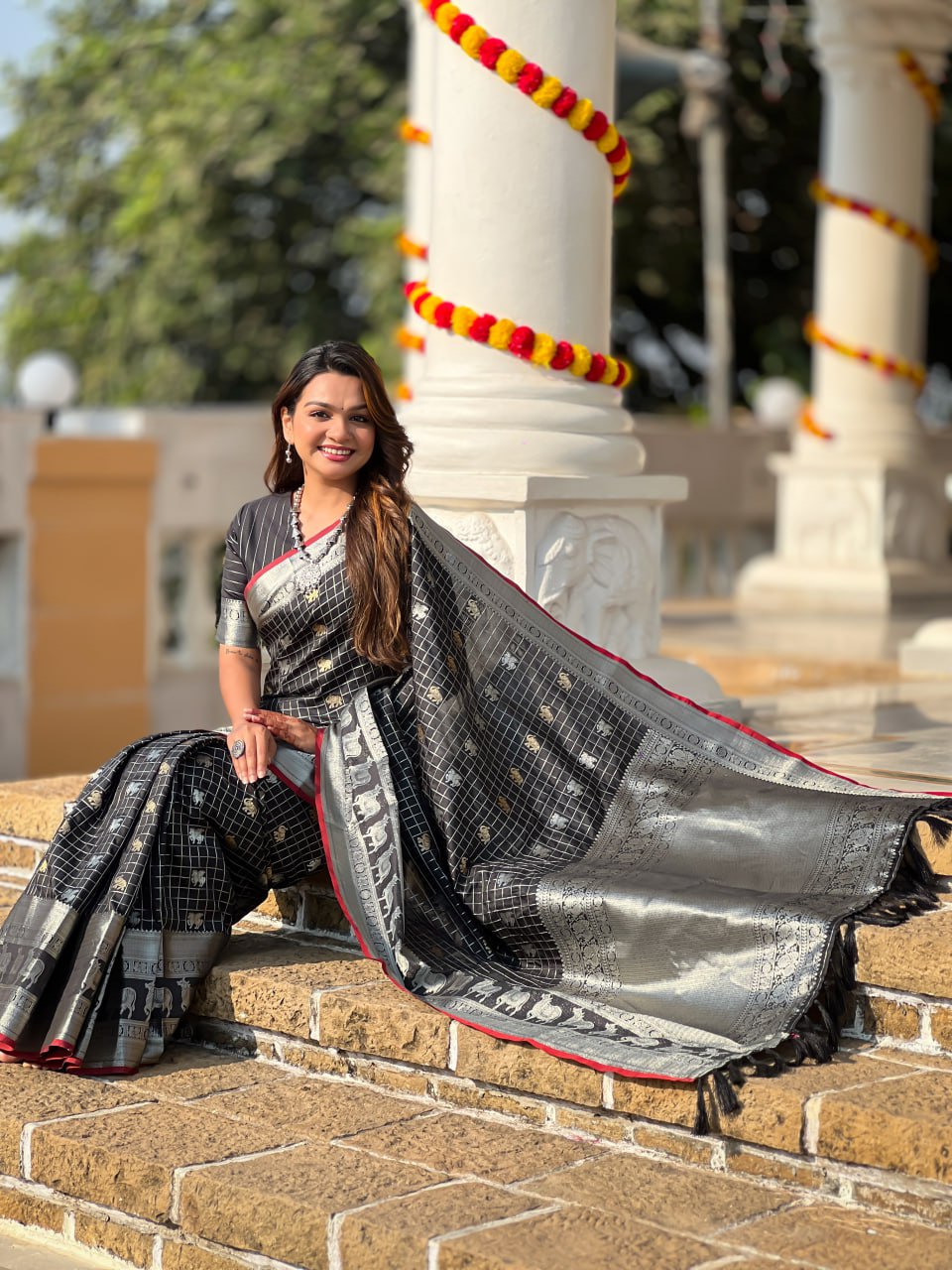 Majestic Black Silk Saree with Silver & Gold Zari Animal Motifs