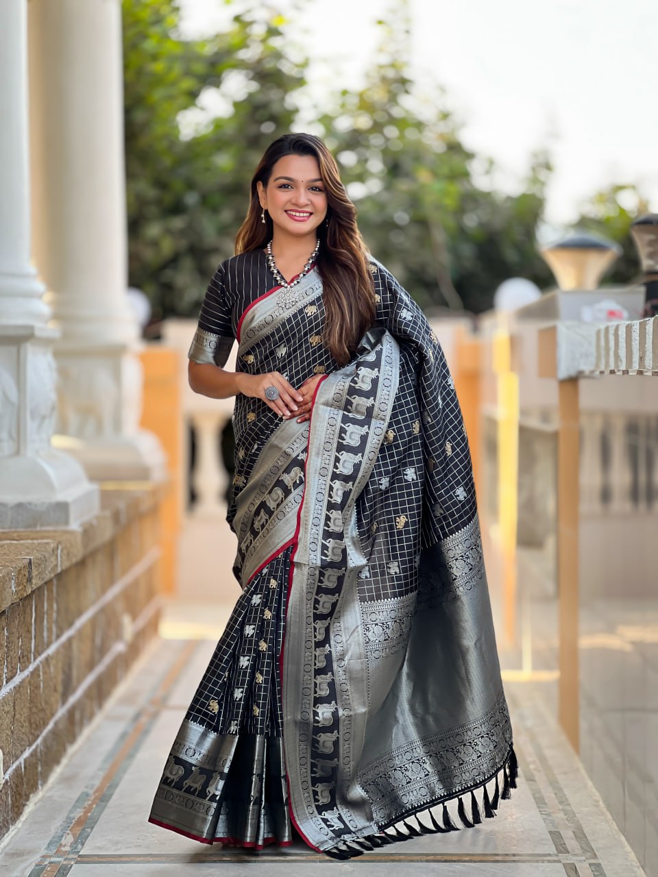 Majestic Black Silk Saree with Silver & Gold Zari Animal Motifs
