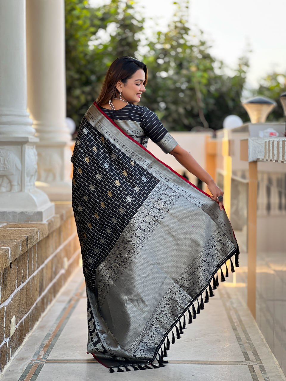 Majestic Black Silk Saree with Silver & Gold Zari Animal Motifs