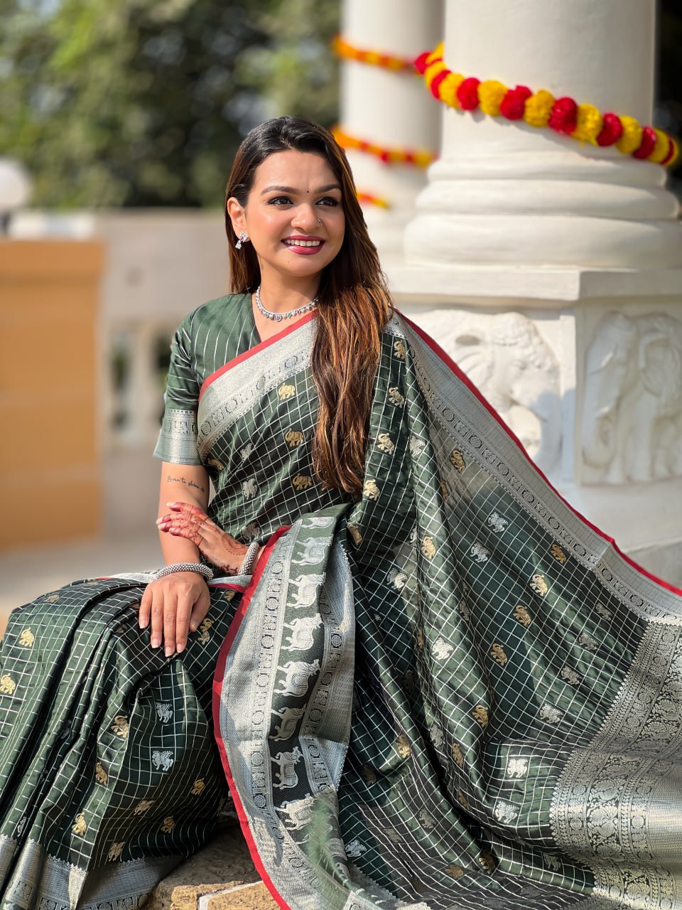 Elegant Bottle Green Silk Saree with Silver-Gold Zari Animal Motifs