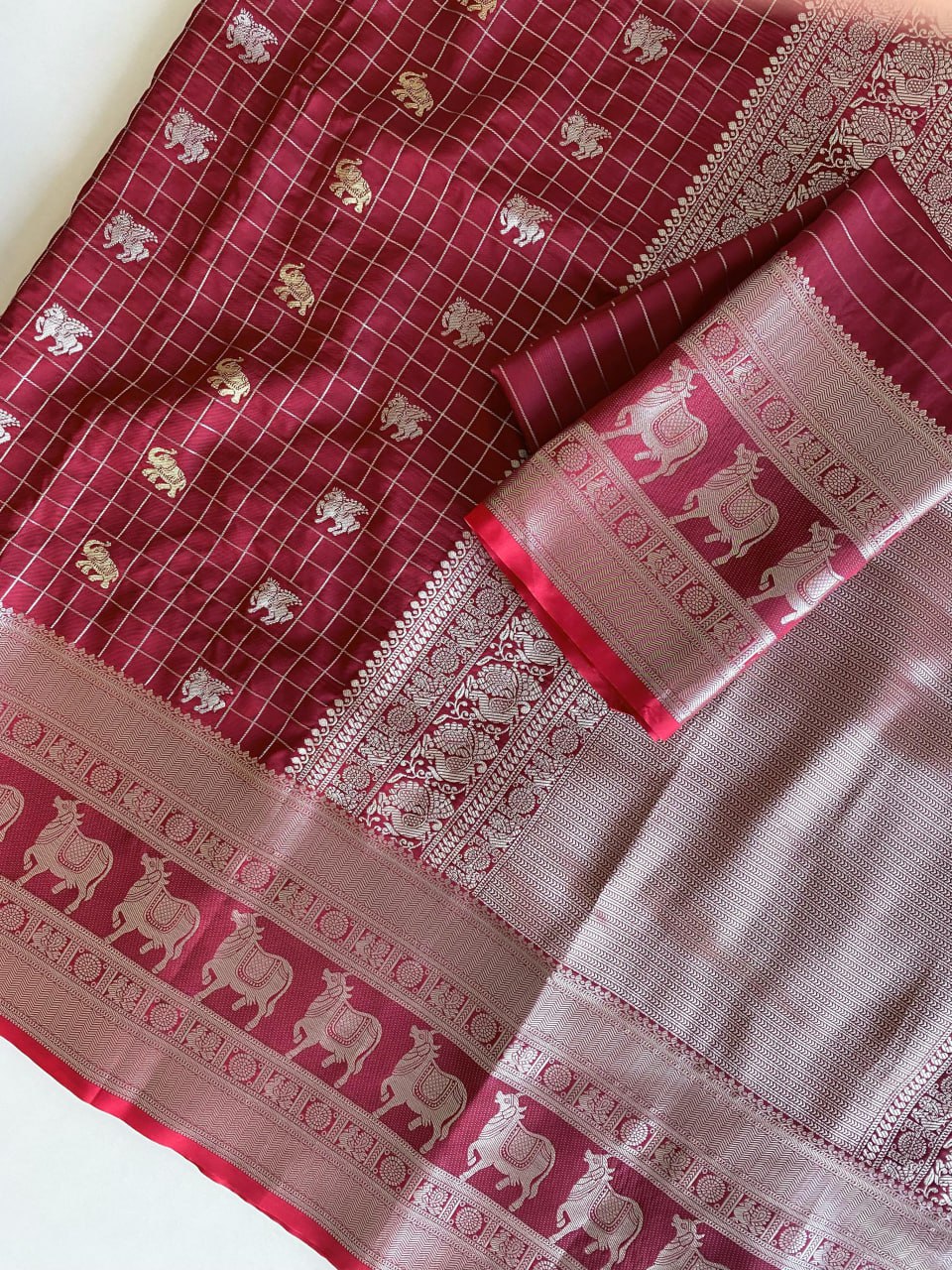 Rich Rani Pink Silk Saree with Silver Zari Animal Motifs