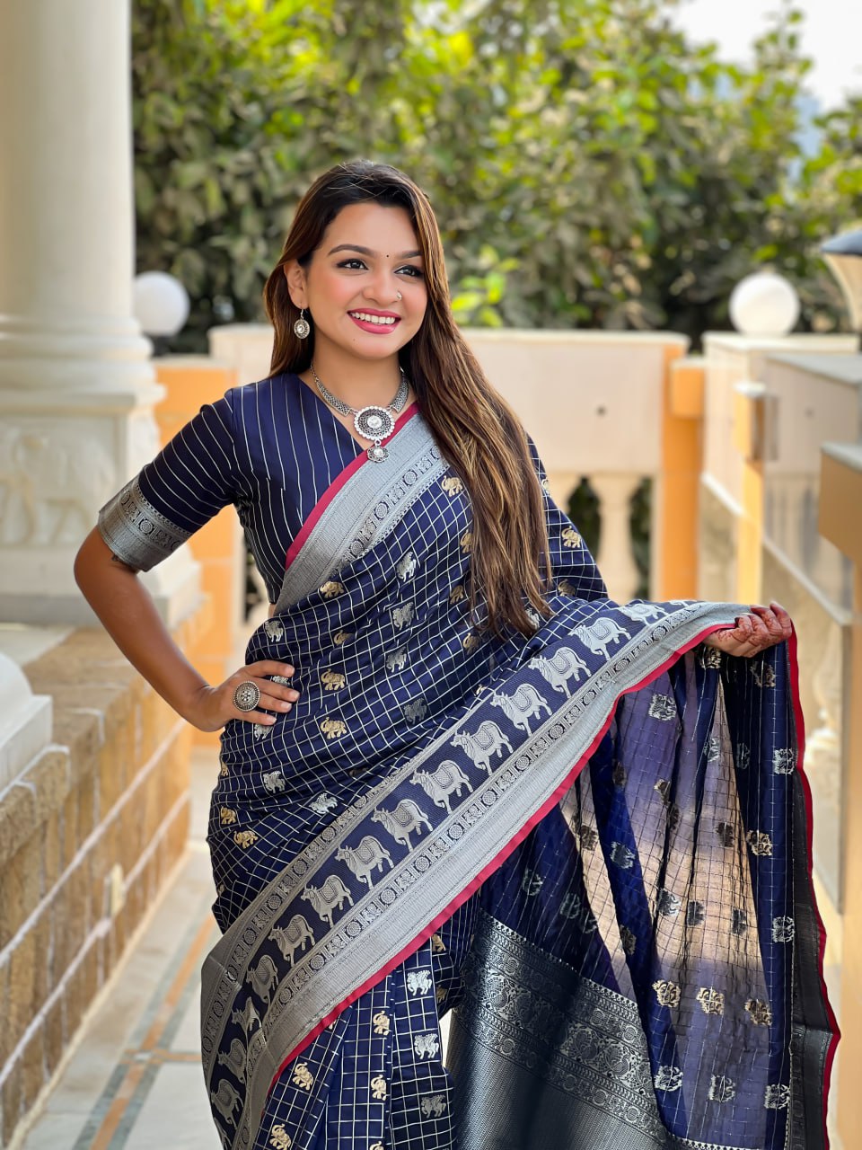 Majestic Navy Blue Silk Saree with Silver Zari Animal Motifs