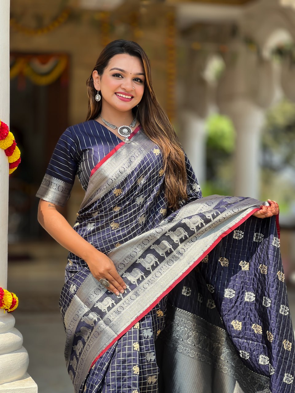 Majestic Navy Blue Silk Saree with Silver Zari Animal Motifs