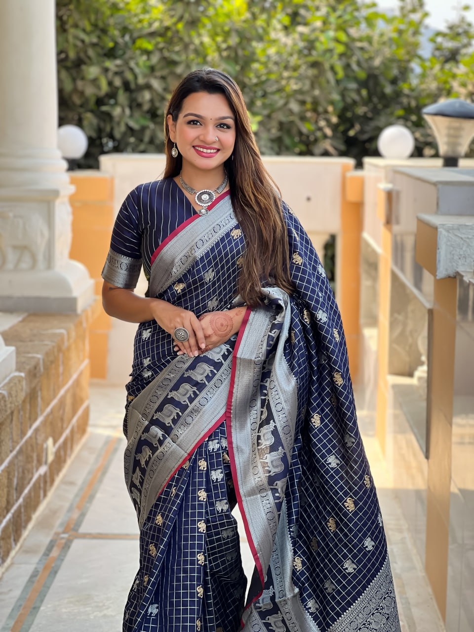 Majestic Navy Blue Silk Saree with Silver Zari Animal Motifs