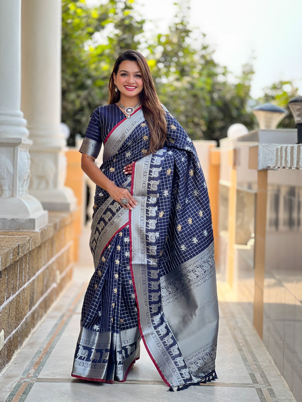 Majestic Navy Blue Silk Saree with Silver Zari Animal Motifs