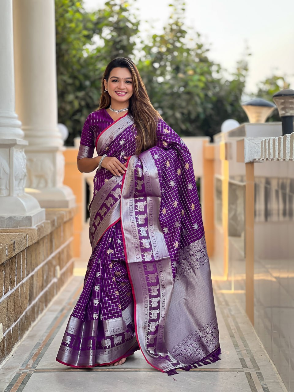Regal Purple Silk Saree with Silver Zari Animal Motifs