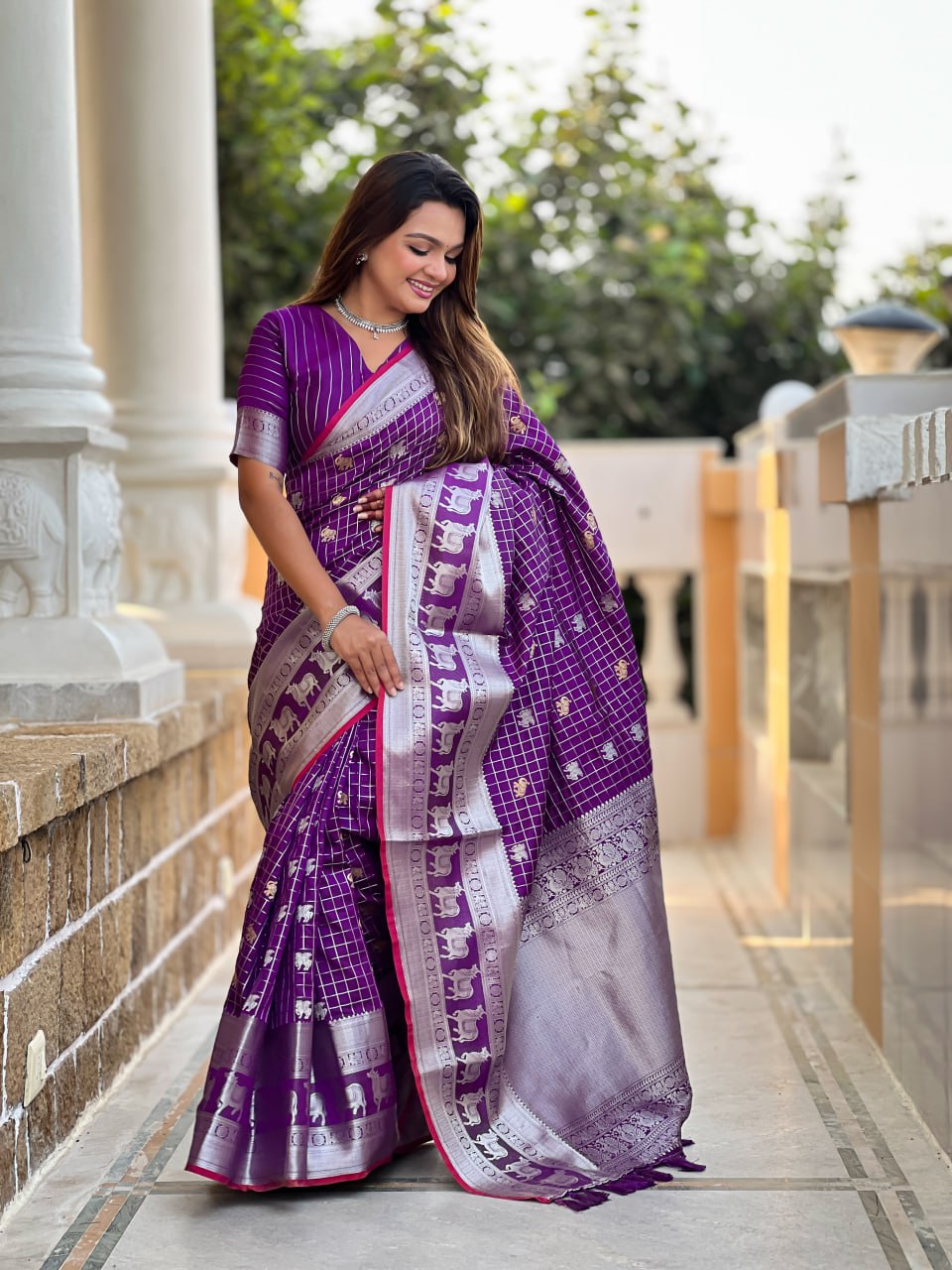 Regal Purple Silk Saree with Silver Zari Animal Motifs