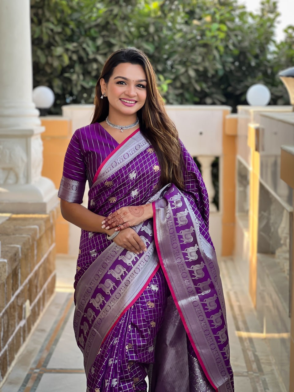 Regal Purple Silk Saree with Silver Zari Animal Motifs