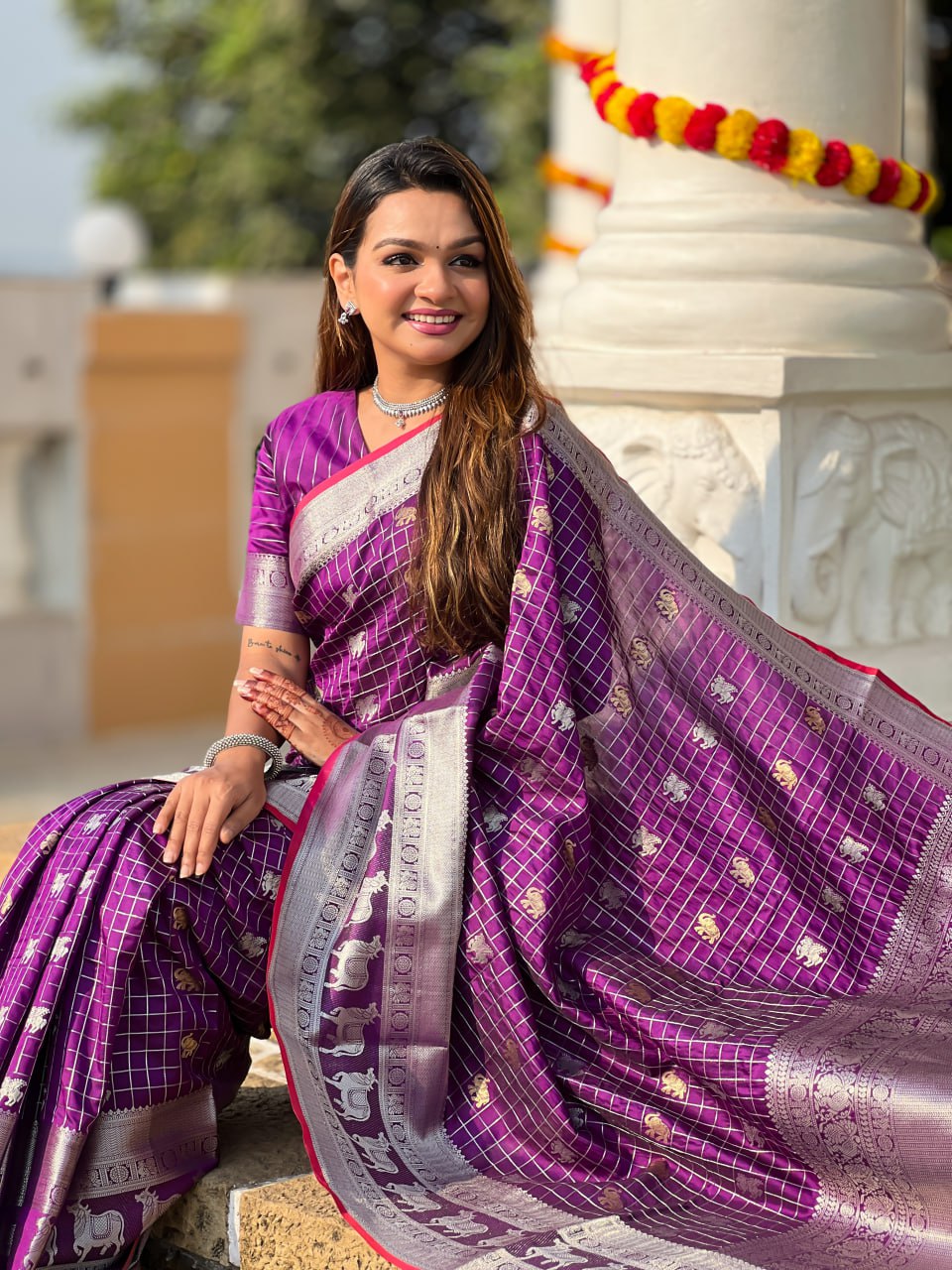 Regal Purple Silk Saree with Silver Zari Animal Motifs