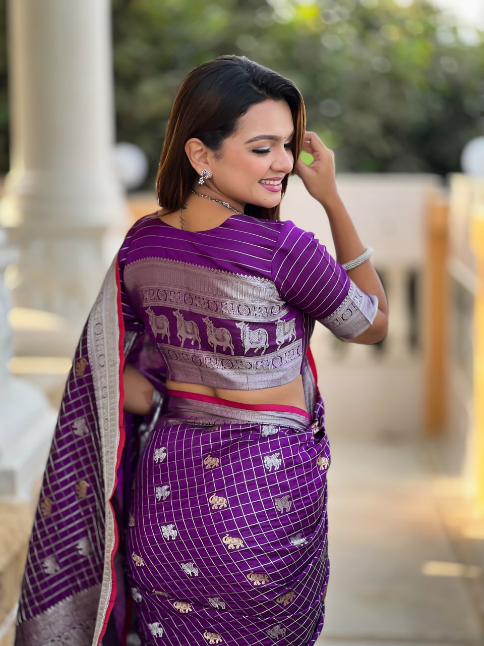 Regal Purple Silk Saree with Silver Zari Animal Motifs