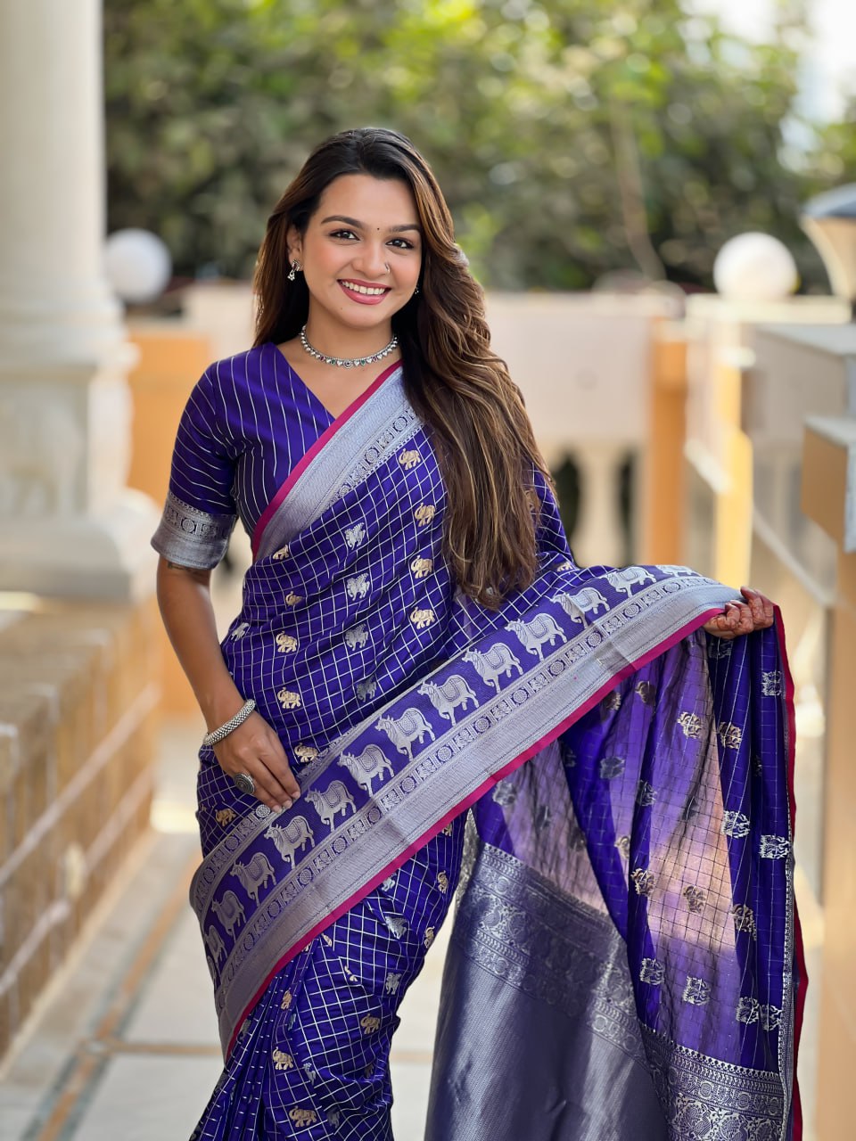 Regal Purple Silk Saree with Zari Animal Motifs