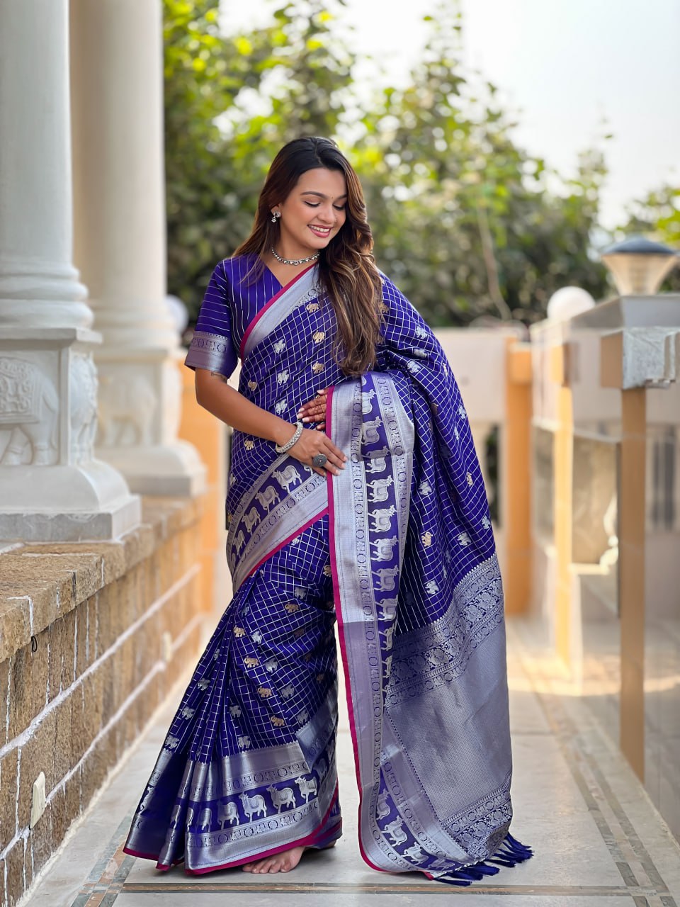 Regal Purple Silk Saree with Zari Animal Motifs