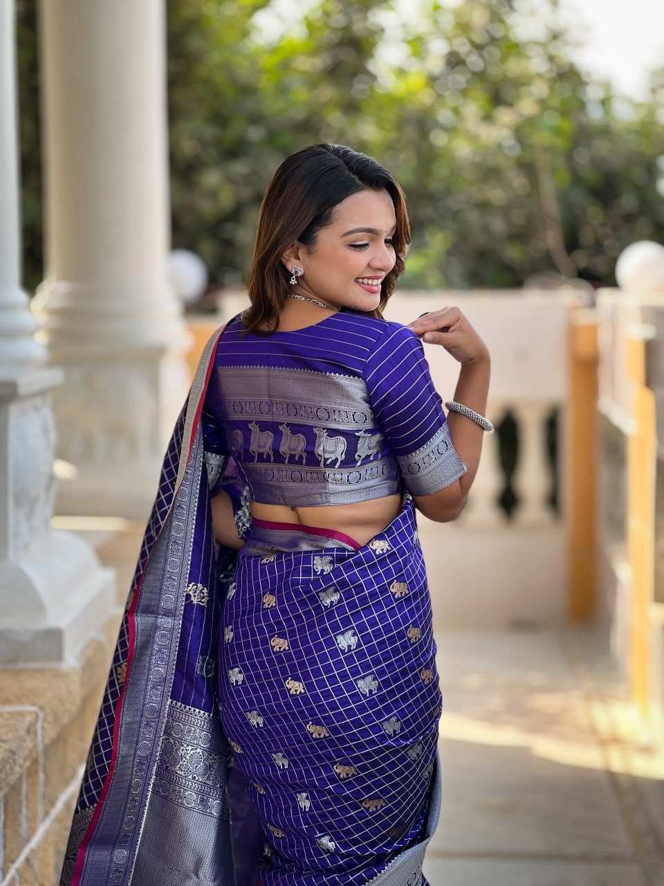 Regal Purple Silk Saree with Zari Animal Motifs