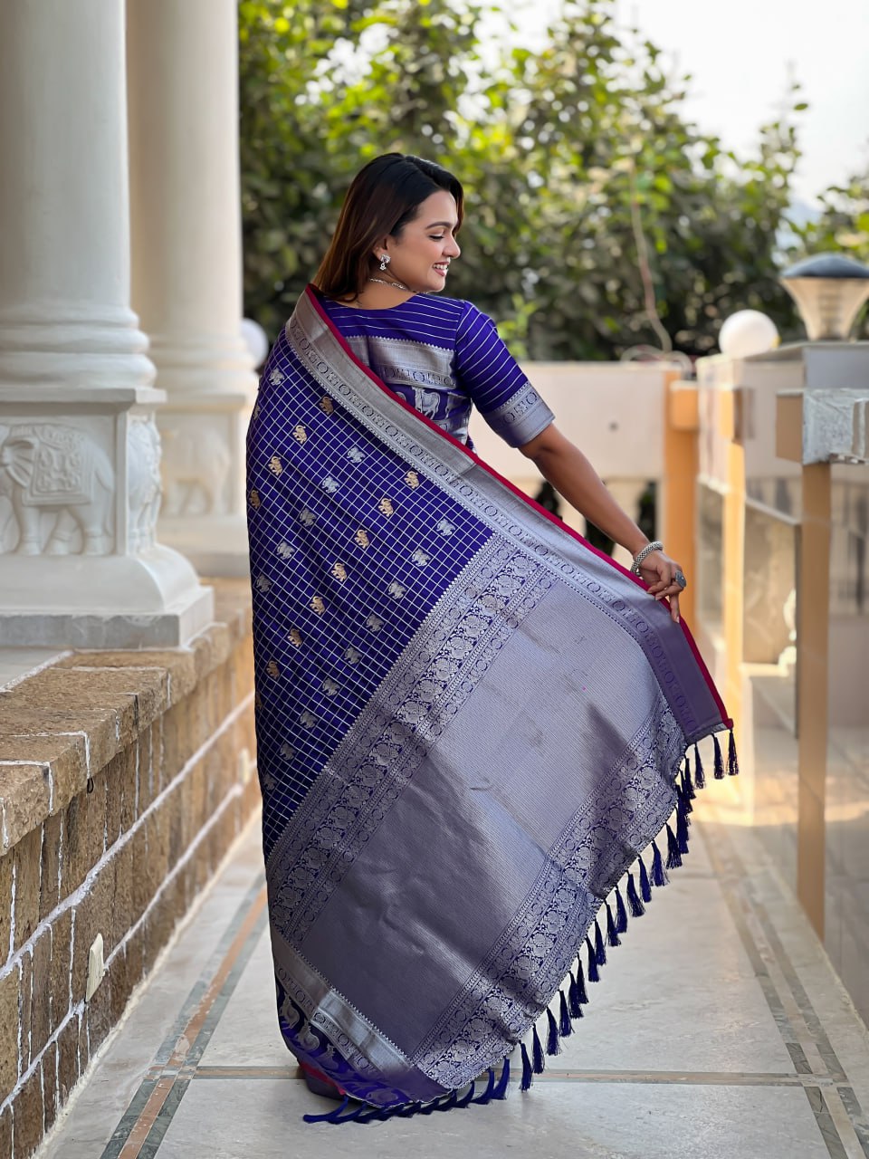 Regal Purple Silk Saree with Zari Animal Motifs