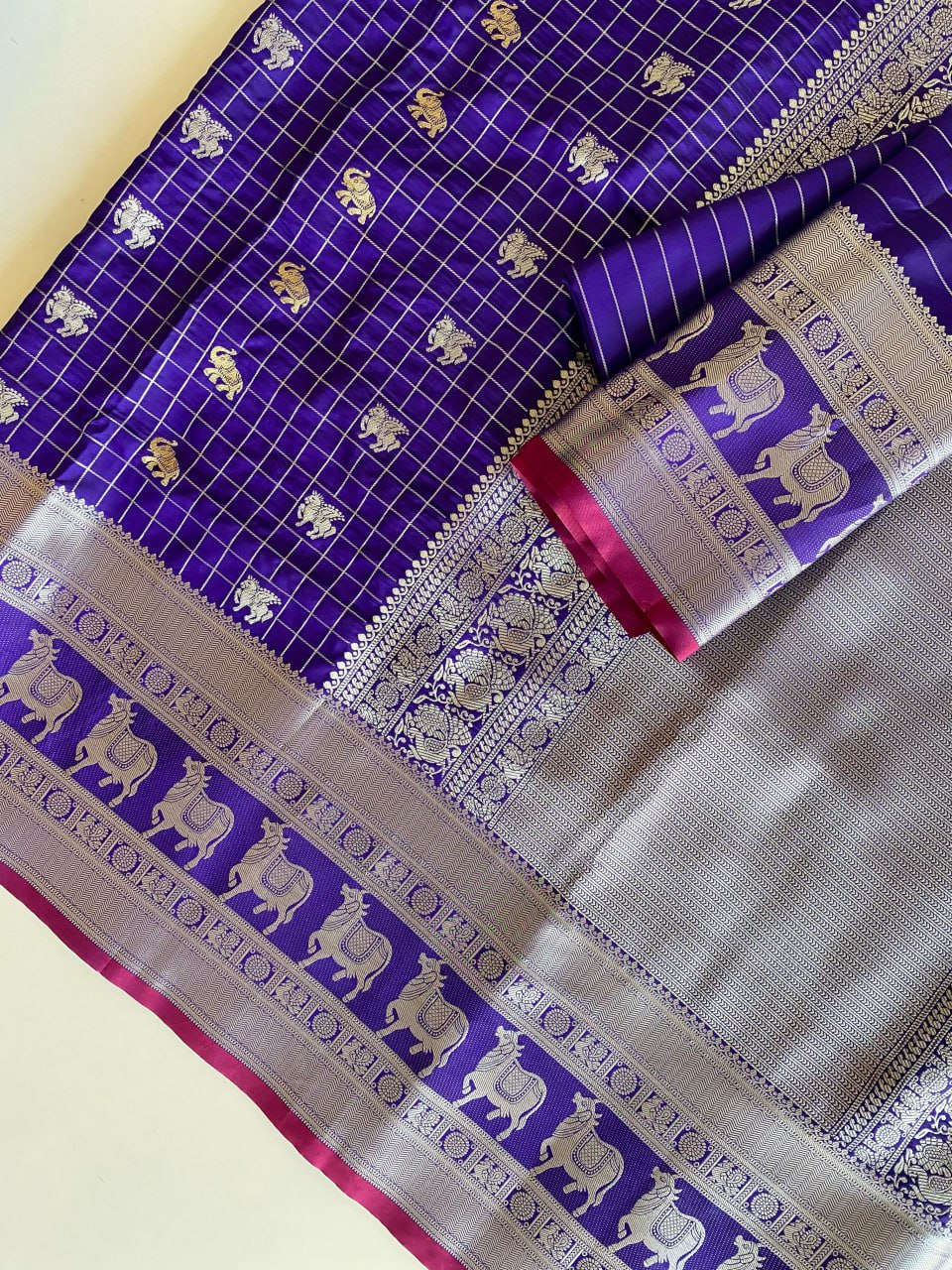 Regal Purple Silk Saree with Zari Animal Motifs