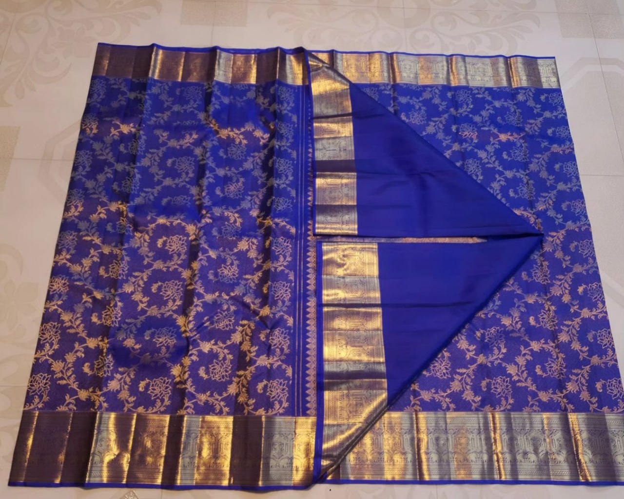 Majestic Royal Blue Kanchipuram Silk Saree with Intricate Floral Zari