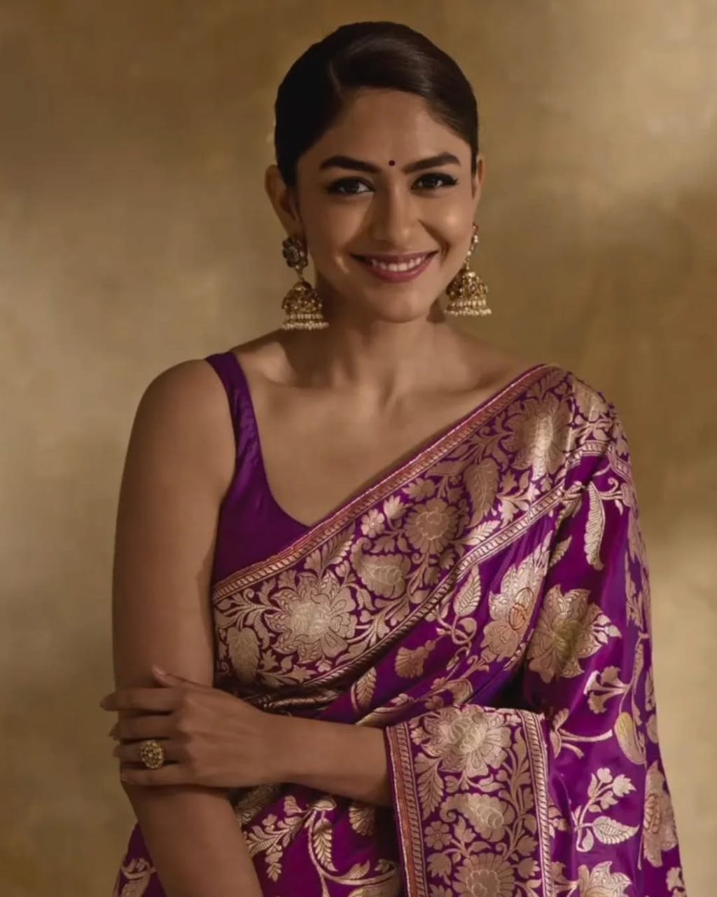 Regal Purple Banarasi Silk Saree with Intricate Golden Zari Floral Weaves