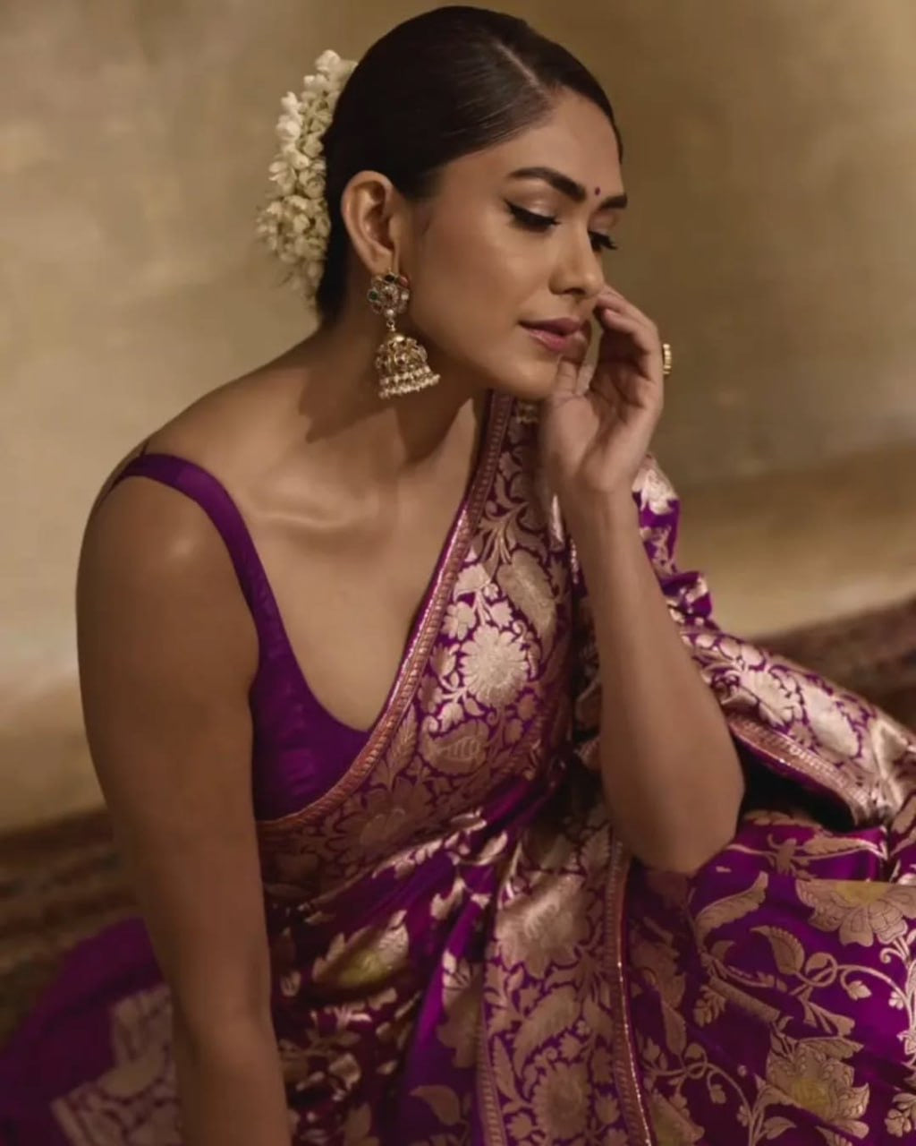 Regal Purple Banarasi Silk Saree with Intricate Golden Zari Floral Weaves