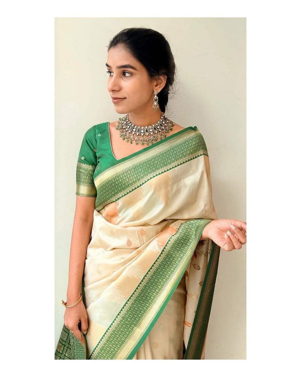 Elegant Cream Kanjivaram Silk Saree with Green Zari Border