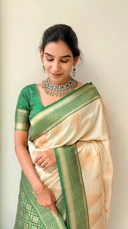 Elegant Cream Kanjivaram Silk Saree with Green Zari Border