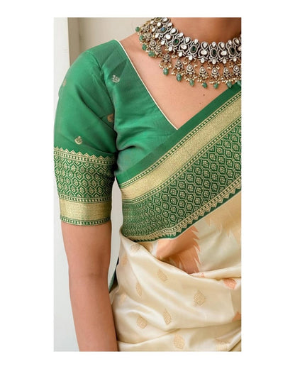 Elegant Cream Kanjivaram Silk Saree with Green Zari Border