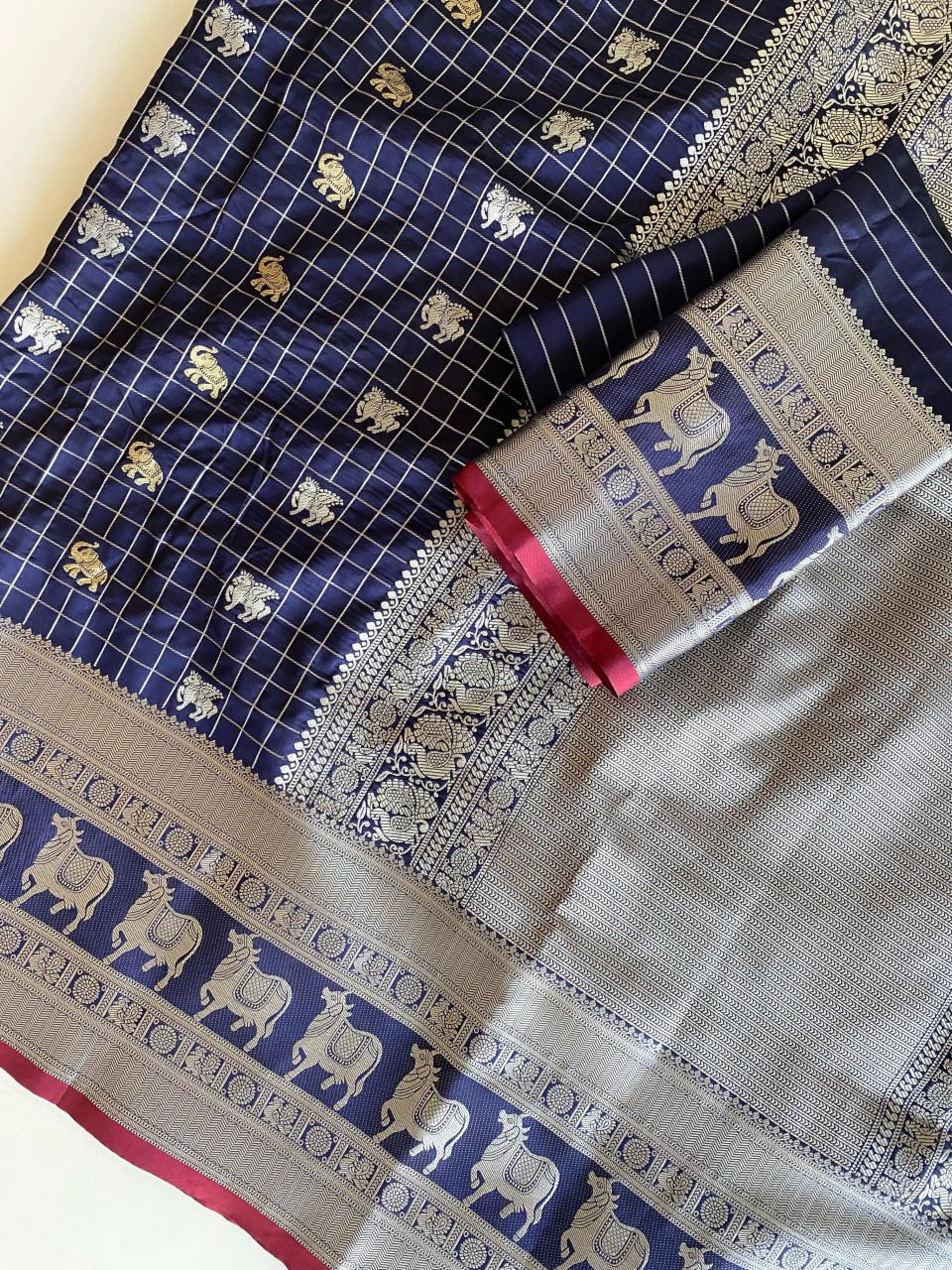 Majestic Navy Blue Silk Saree with Silver Zari Animal Motifs